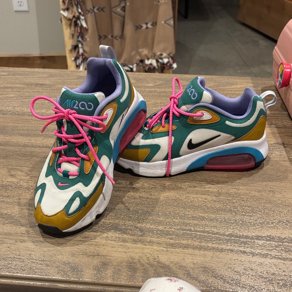 Nike Sneakers with Pink and Green Accents